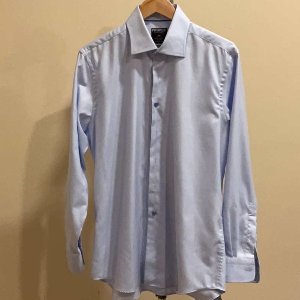 Men’s blue broad collar dress shirt.